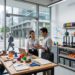 A team collaborating in a modern workshop, demonstrating practical applications of 3D printing for small businesses in a vibrant business district.
